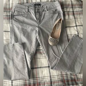 Gray straight leg jeans.